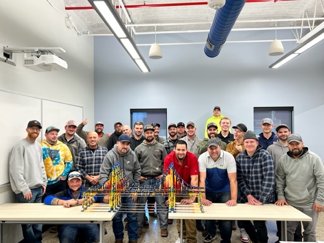 A group of attendees at an ABC West Michigan construction institute event